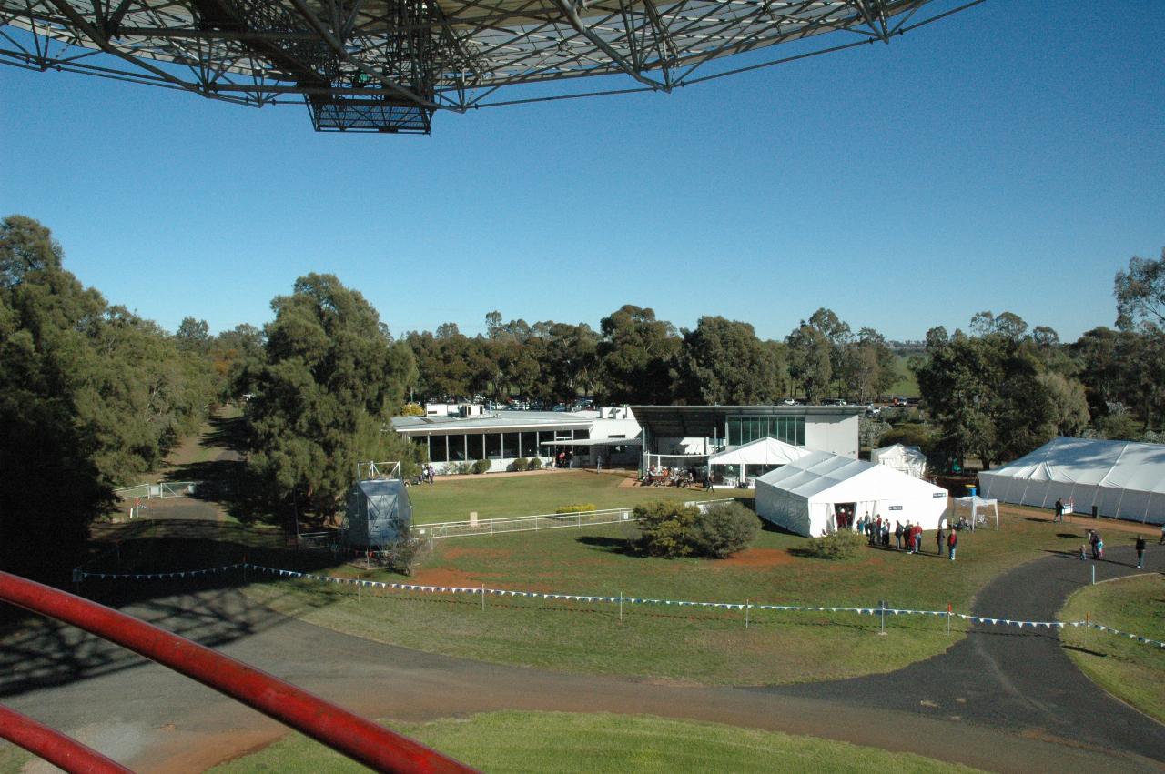 Visitor building and open day tents seen below dish