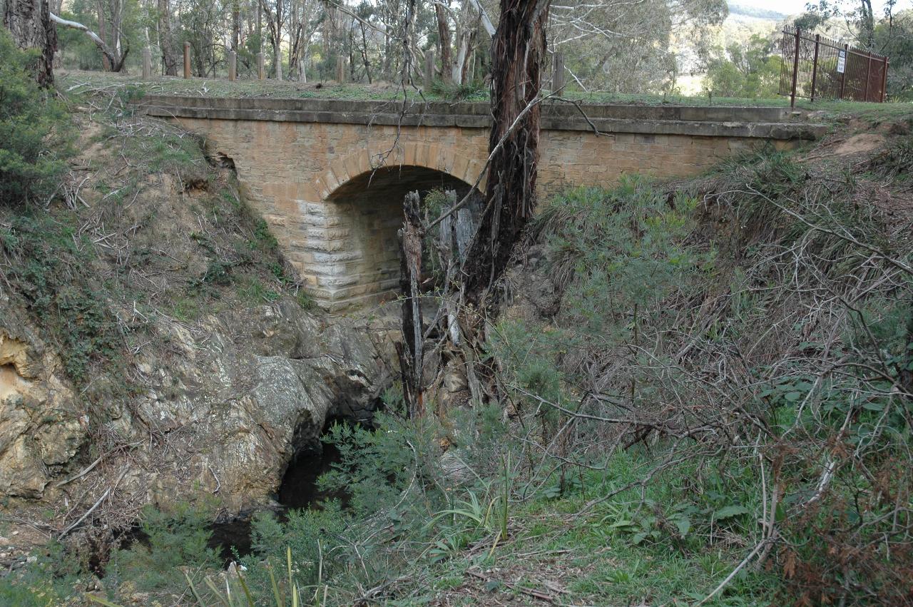 Stone bridge over small creek in a steep sided gully