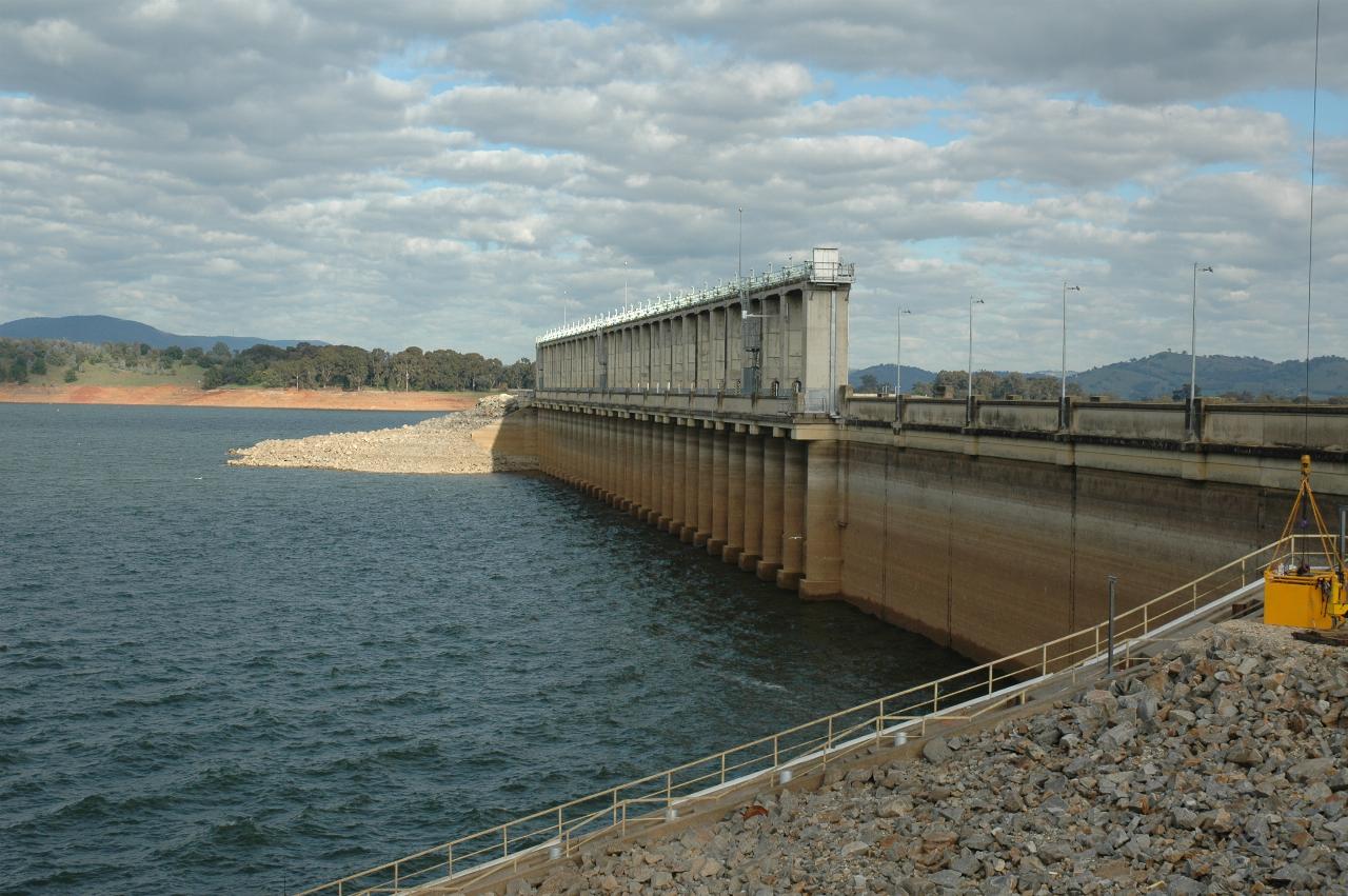 Concrete dam wall, with stains showing higher water levels