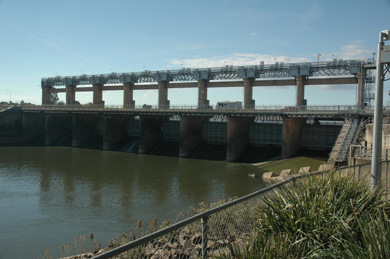 Downstream view of dam with control gates and control structures