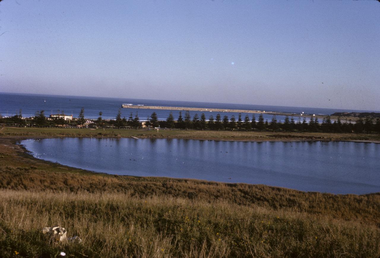 Lagoon, strip of land to ocean and distant beach