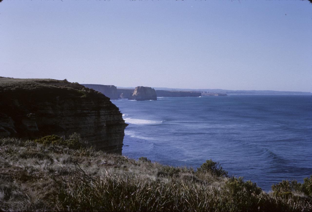 Coastline with inlets heading into distance, and one island stack
