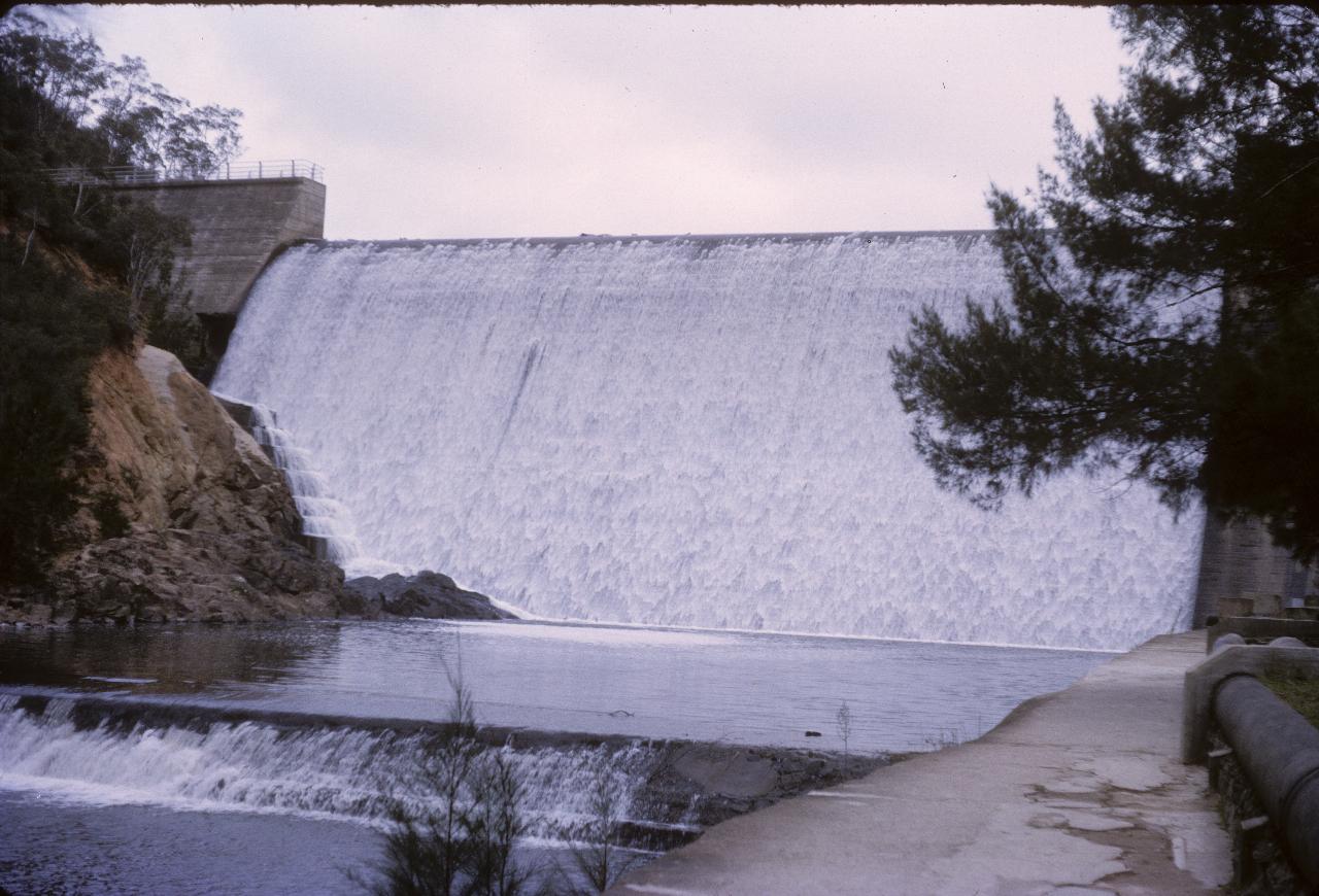 Water flowing over dam spillway