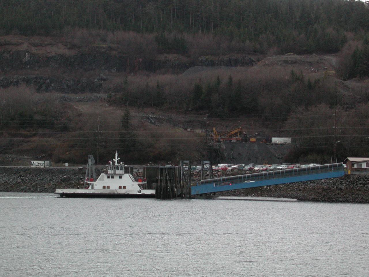 Small car ferry crossing channel from Ketchikan