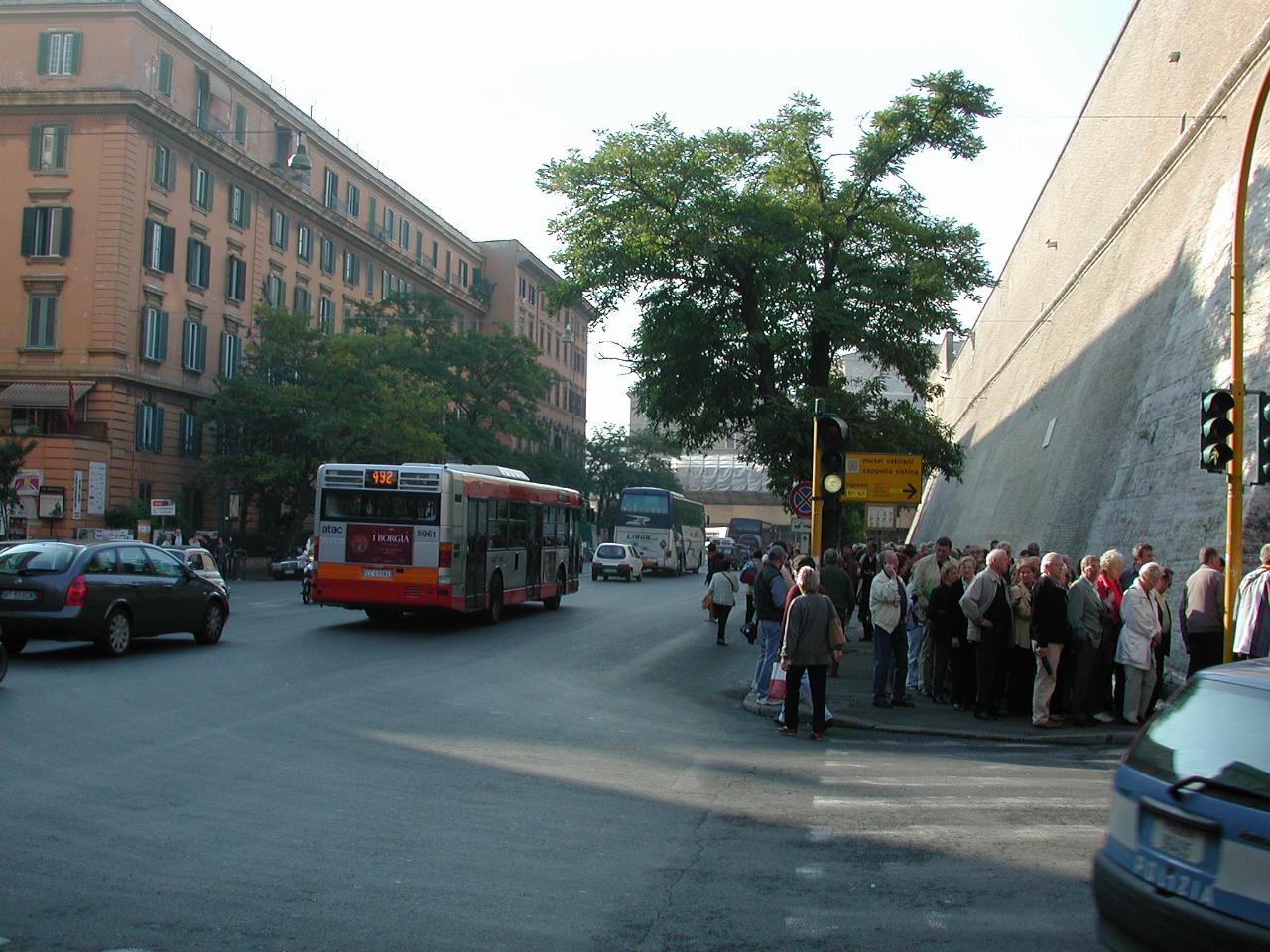 Queue waiting to enter Vatican Museum; Vatican walls on right