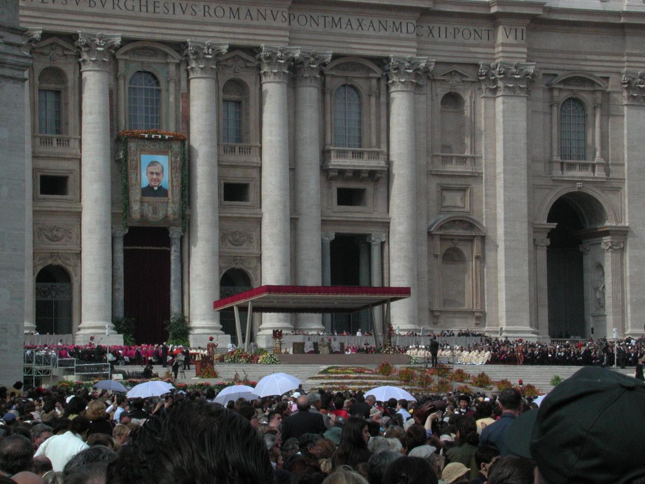Priests were under the white umbrellas to make their location highly visible
