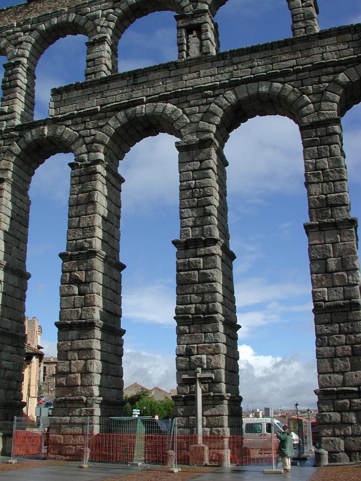 Roman viaduct/aqueduct at Segovia including a statue and cross