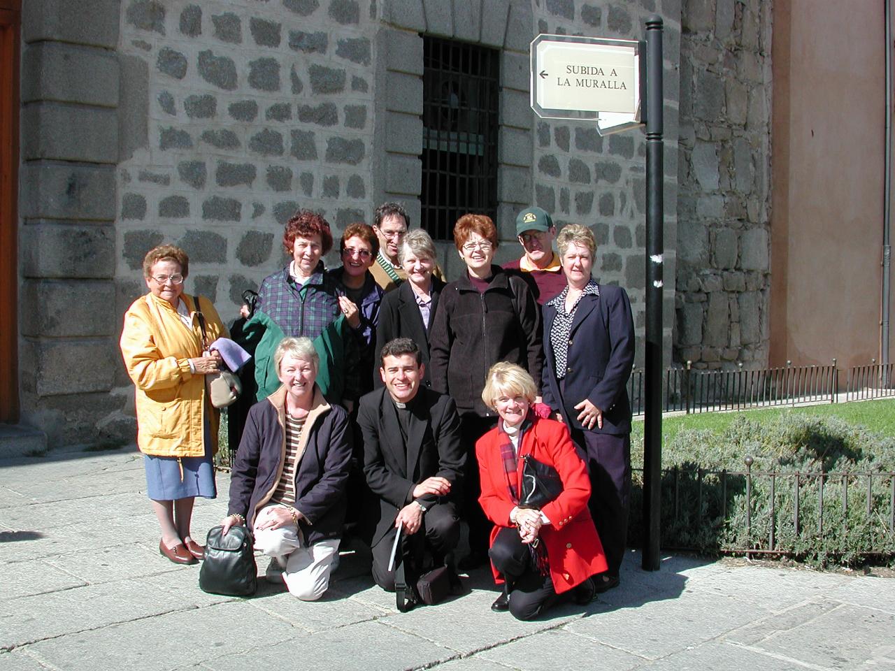 Part of group outside Avila walls: Antoinette, Margaret, Carmen, Nick, Gabriella, Helen, Peter, Cath; Yvonne, Father Mark, Leonne