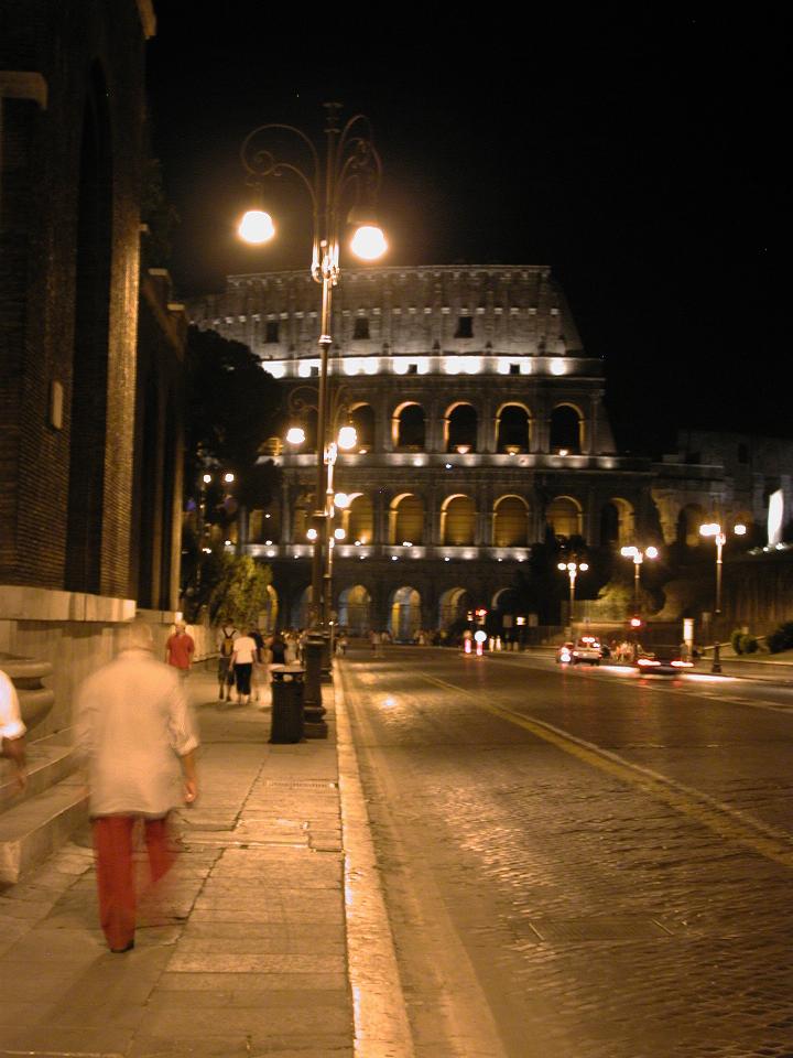 Colosseum at night, as seen along Via Dei Fori Imperali