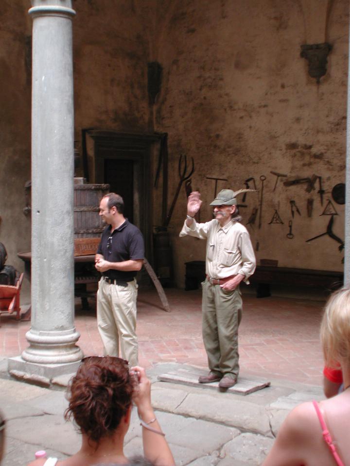 In the castle courtyard, with castle guide and old groundskeeper
