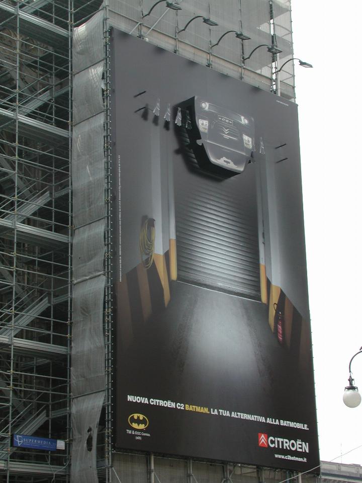 An advertisement on Milan's Duomo restoration scaffolding