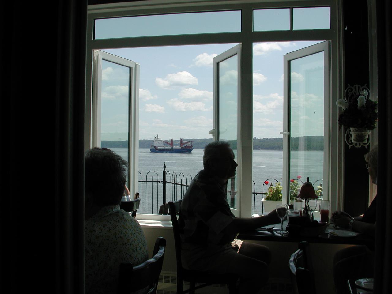 As seen from our lunch stop, a ship travelling upstream on the St. Lawrence, a little below Quebec City