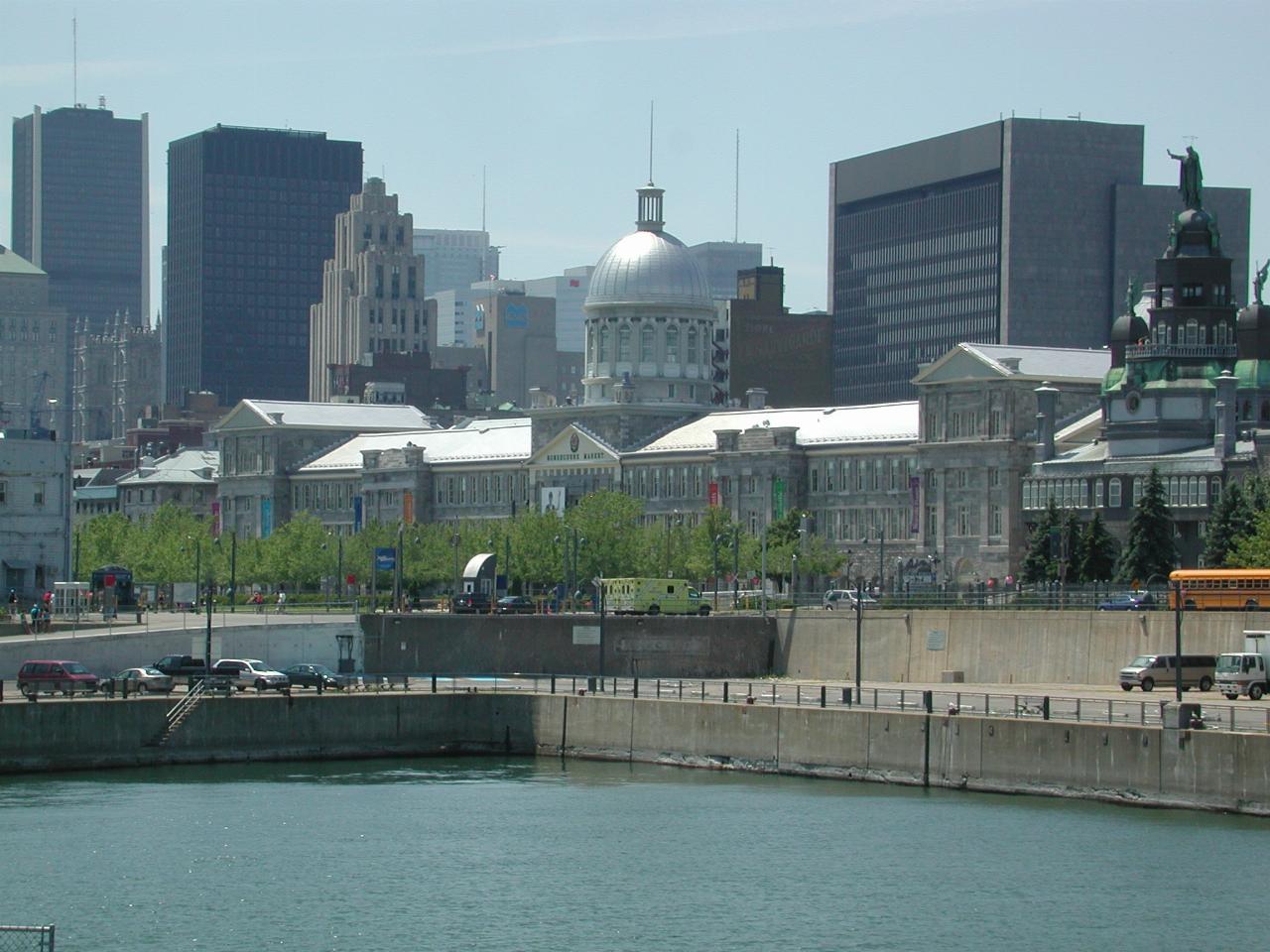 Downtown Montreal from near Clock Tower on Harbour Basin showing Bonsecours Market