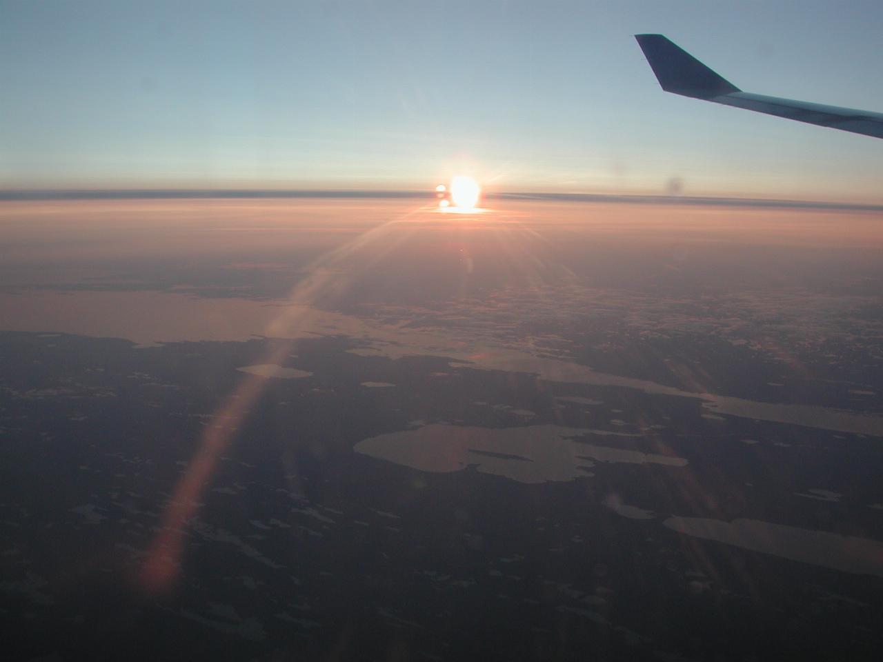 KPLU Viking Jazz: Sunset over northern Canada on way to Copenhagen
