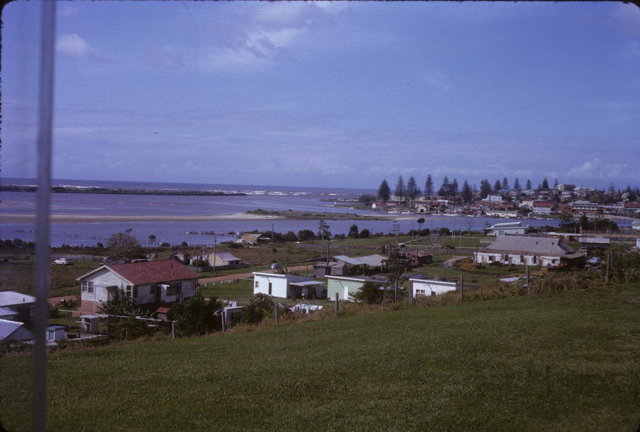 View from hill, over nearby homes and bay