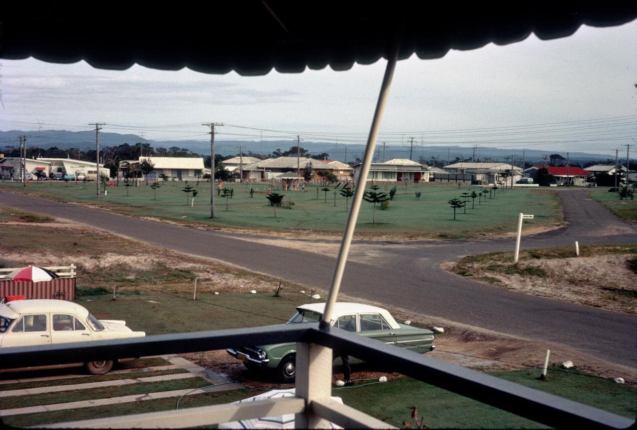 View from balcony to flat, triangular park and houses beyond