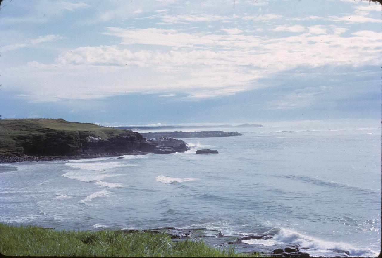 Small bay and 2 breakwaters beyond