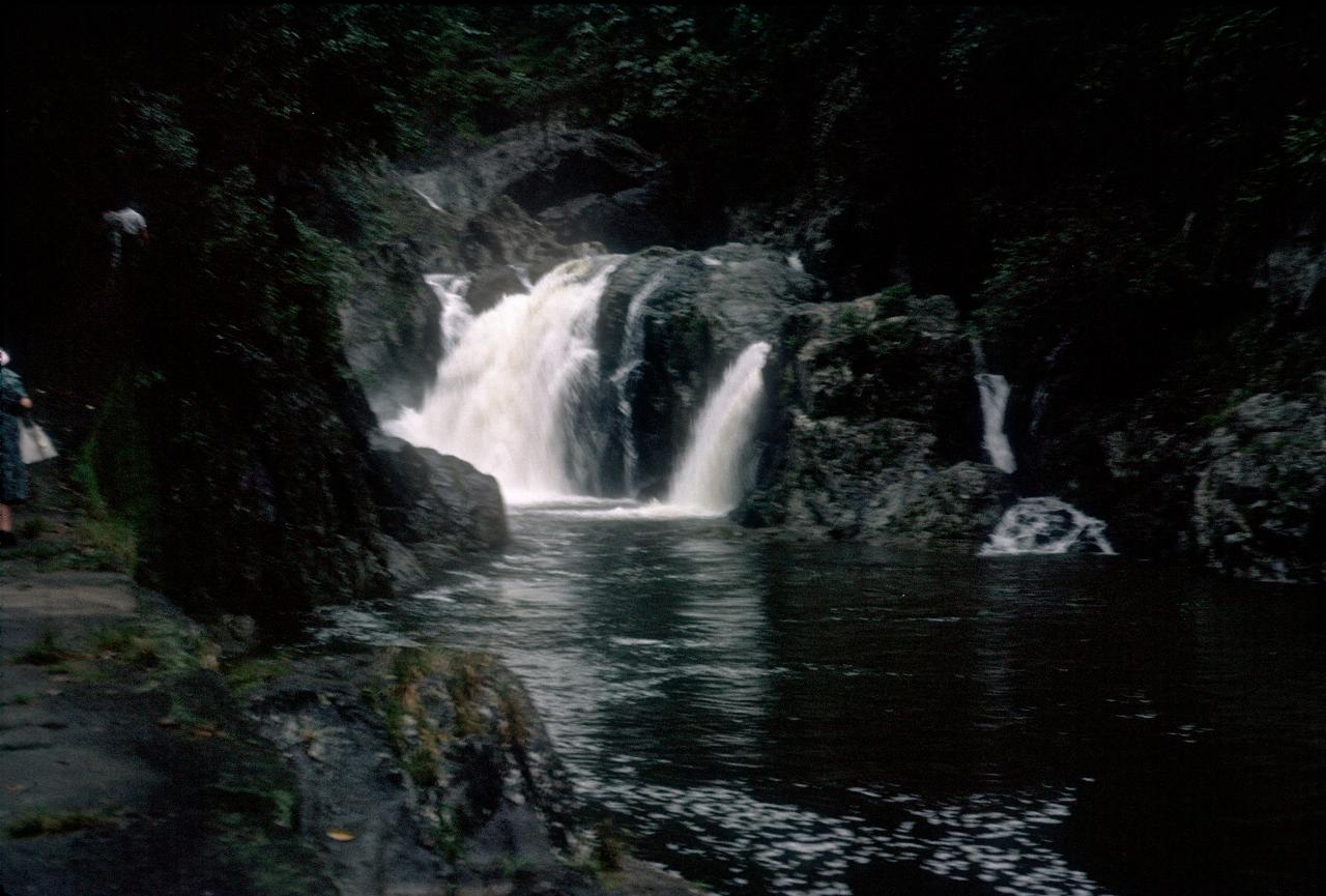 More falls into pool alongside path