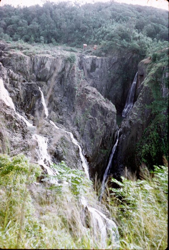 Thin waterfalling over vertical rocky crag