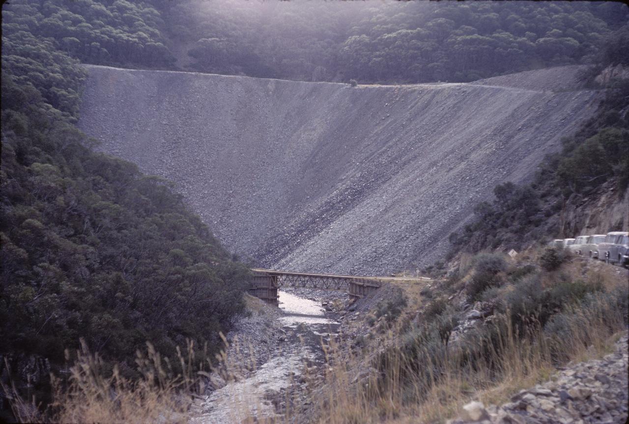 Mountainside with rock fill spilling down it