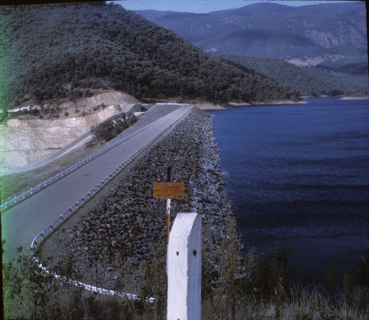 Rock covered earth dam with high water level