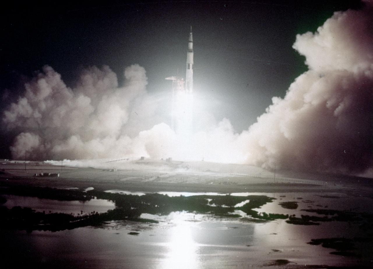 Saturn V rocket about to clear launch tower