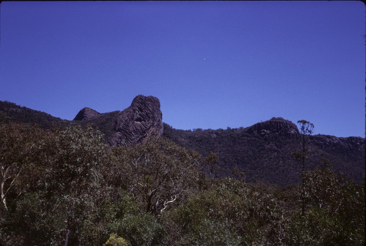 Small volcanic plugs among bushes