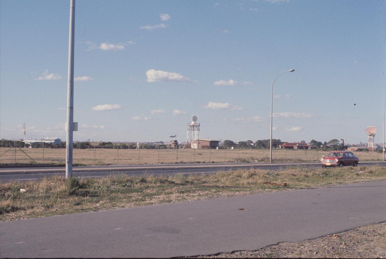 View across road to radar and assorted low buildings