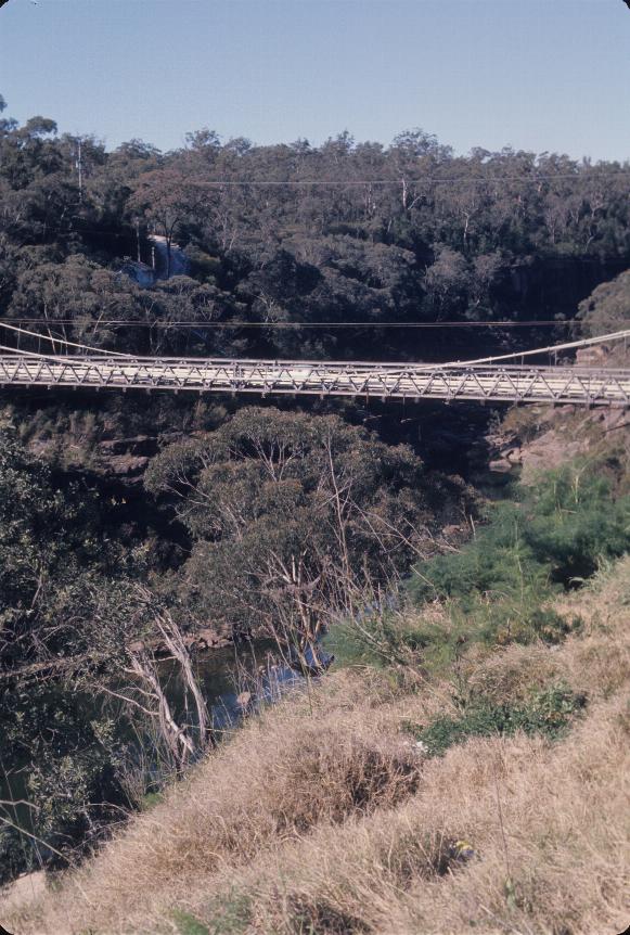 Centre section of suspension bridge showing river way below