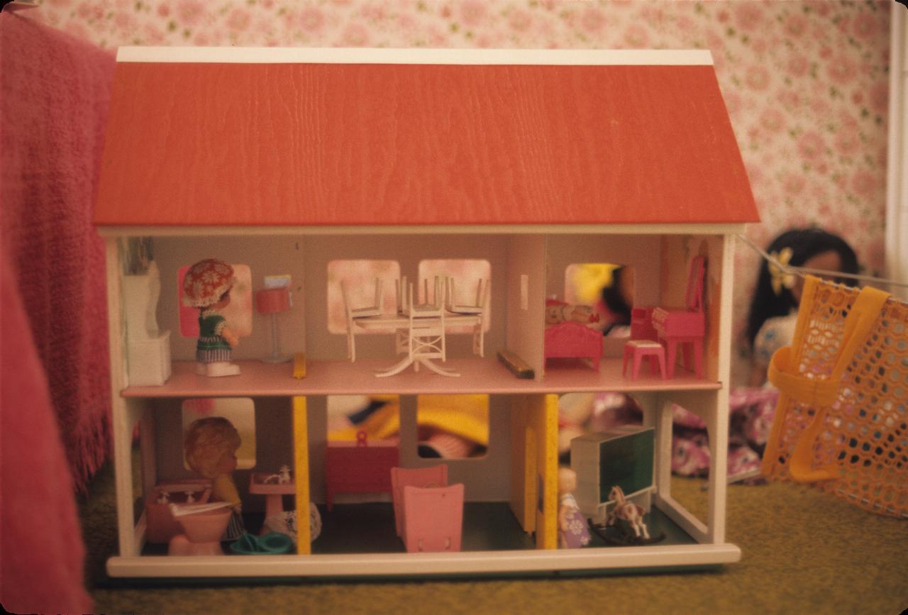 Little girl's doll house, complete with furniture etc.