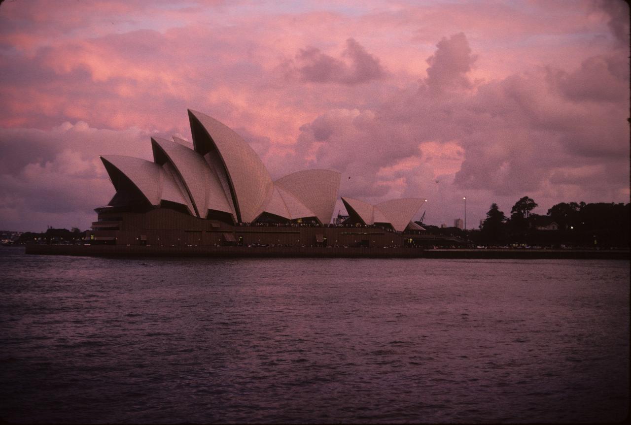 Sydney Opera at dusk, viewed across Circular Quay