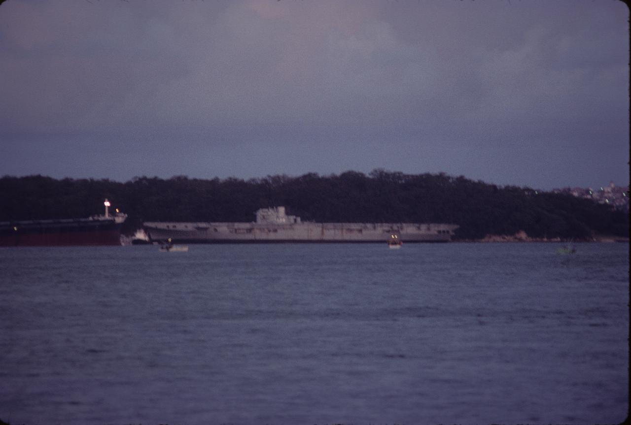 Former air craft carrier, stripped, seen across water