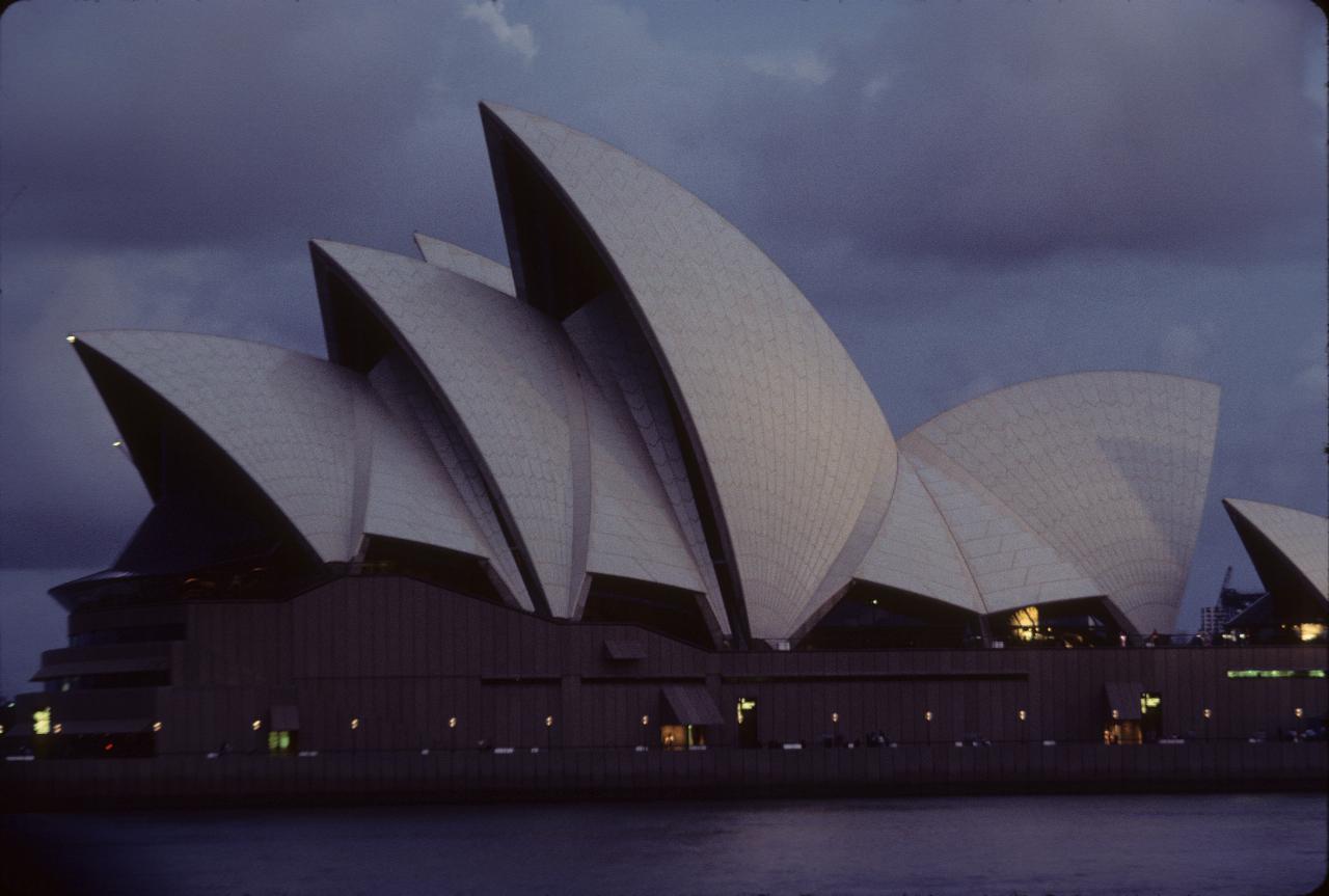 Sydney Opera at dusk, viewed across Circular Quay