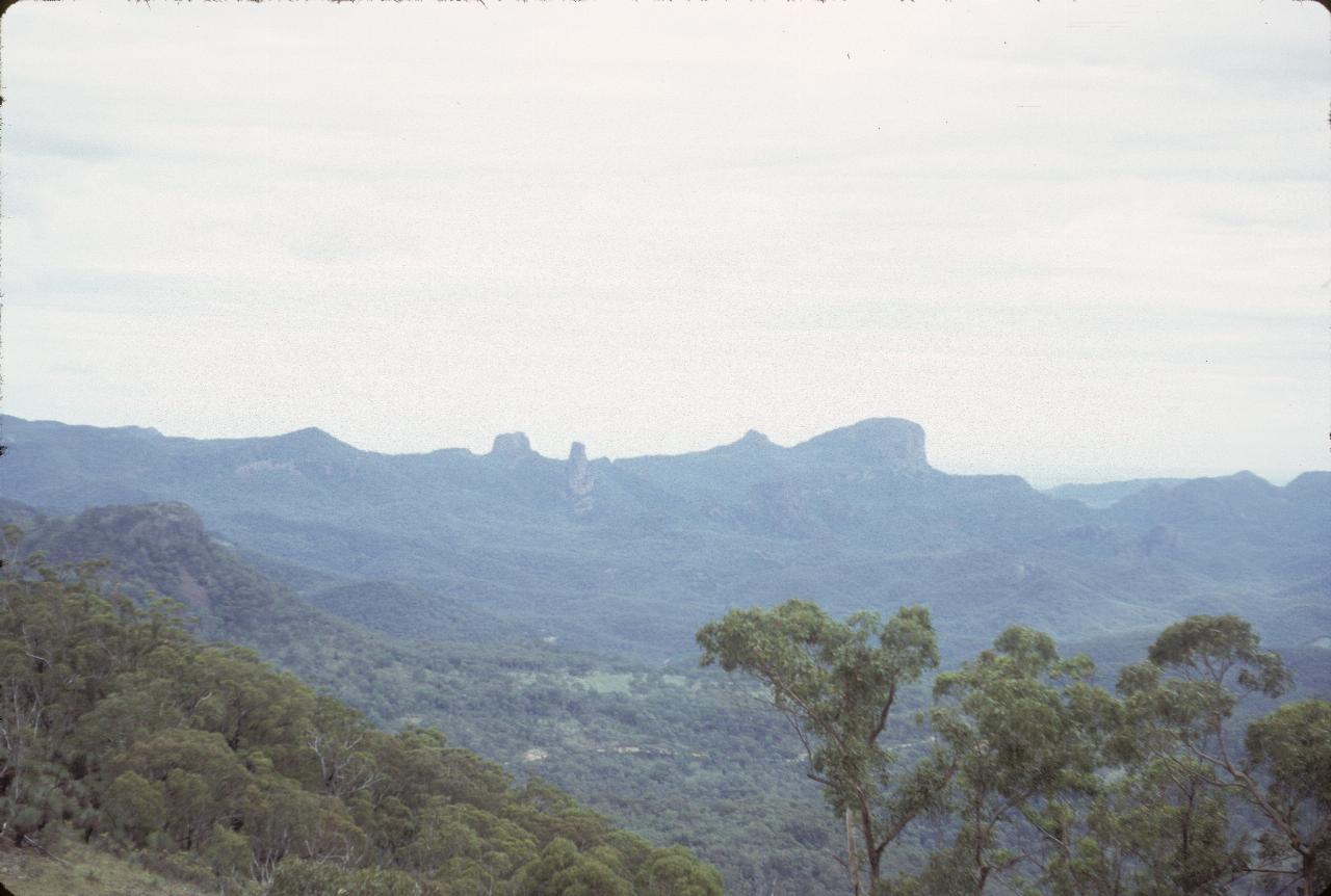 View across valley to jagged mountains