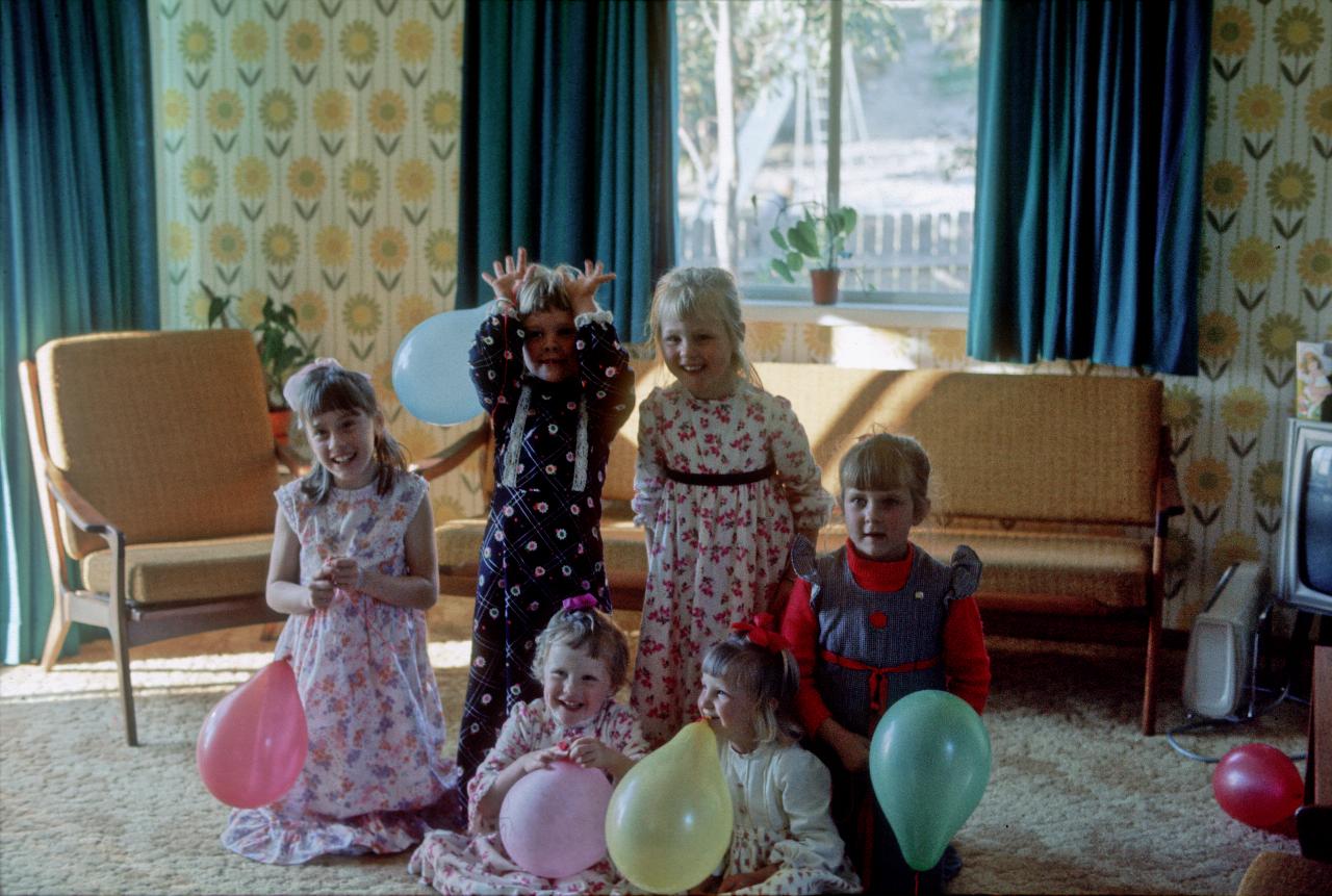 6 little girls on the floor; 4 in back row stanind, 2 in front sitting