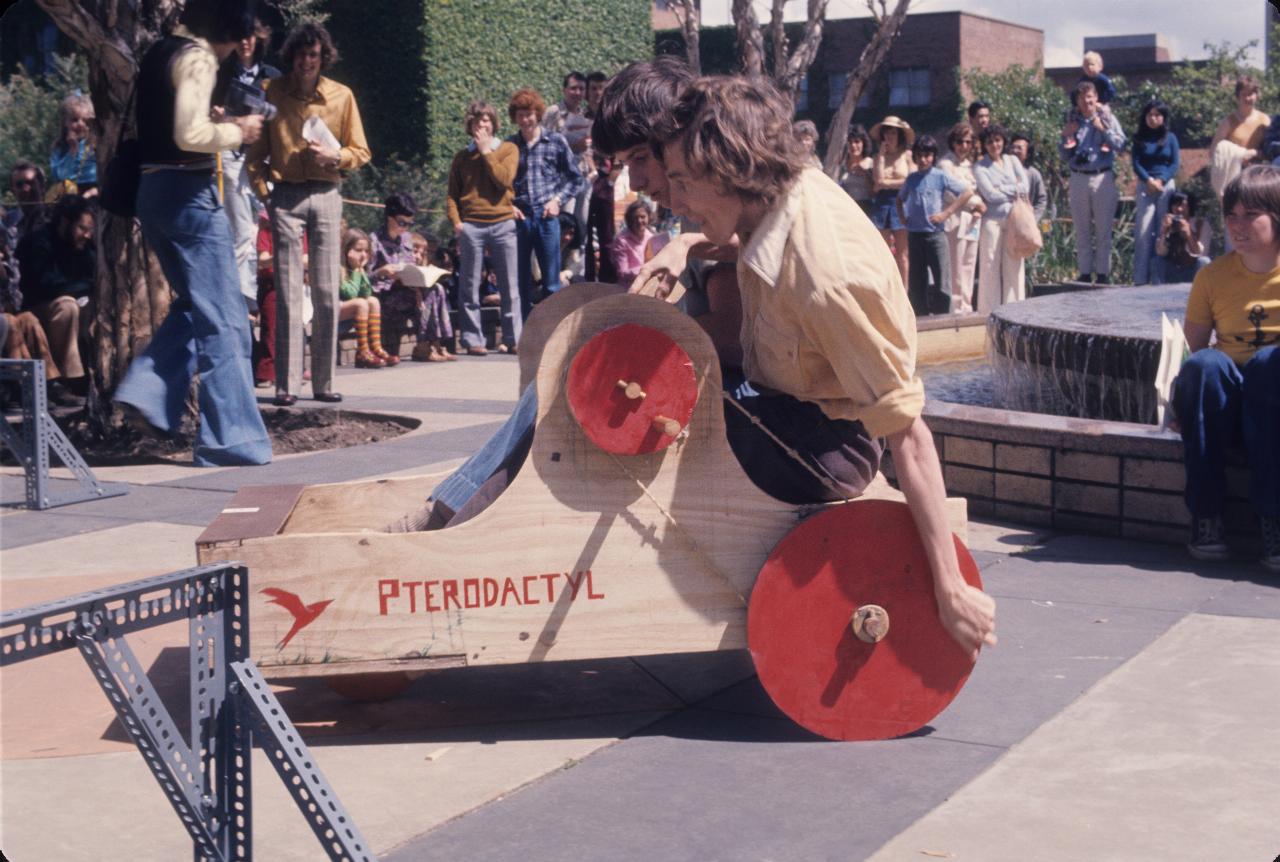 A seating position billy cart with a drive system