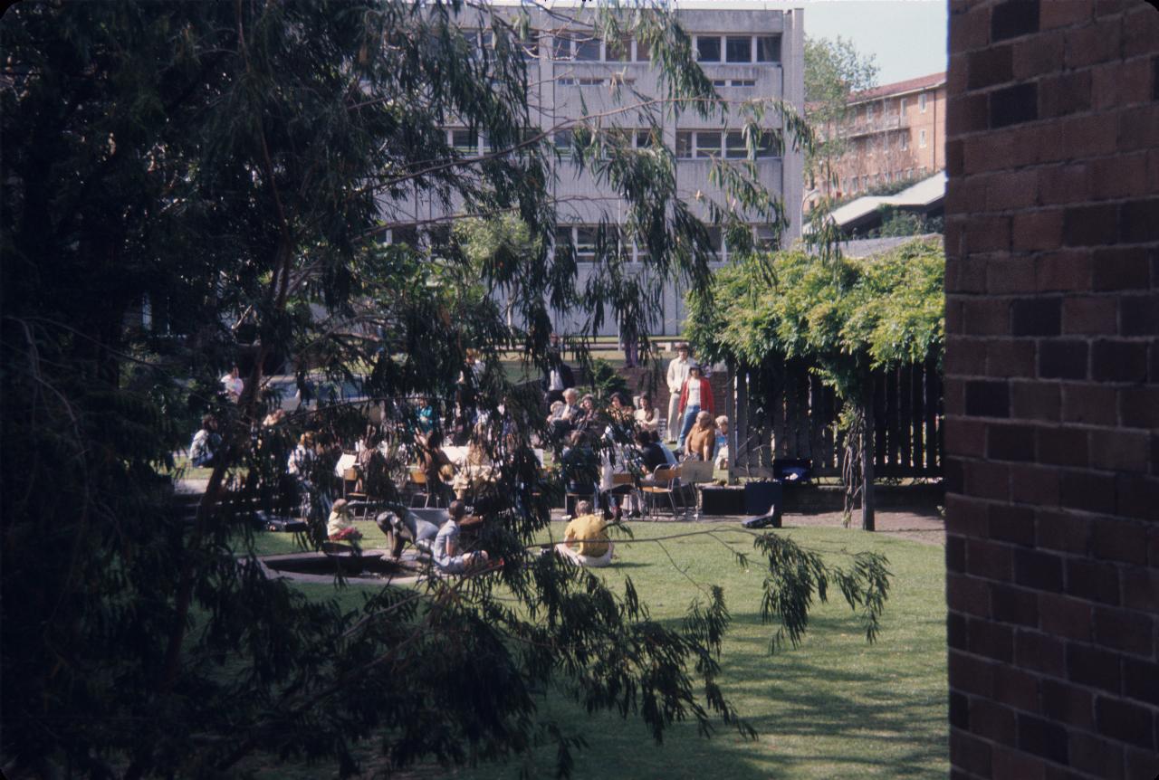 Grassy courtyard with musicians