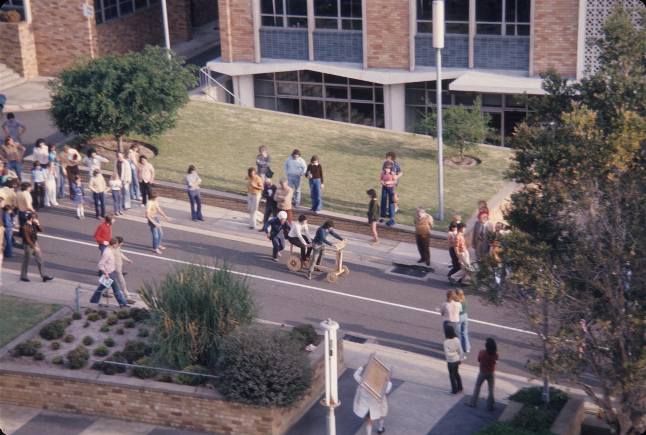 The tandem bicycle style team riding down the hill