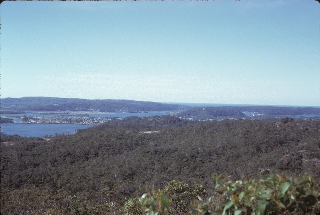 View from mountain across bays and assorted settled areas with houses