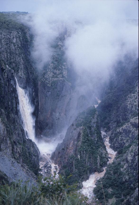 Two waterfalls into deep valley with sheer sides