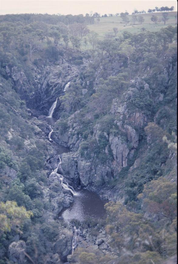 A series of waterfalls from fields into gully