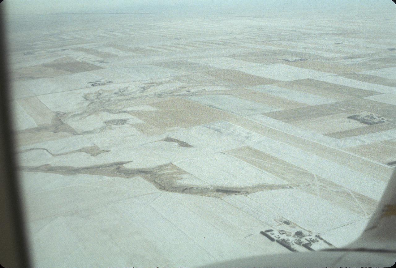 Snow covered fields between Lethbridge and Calgary