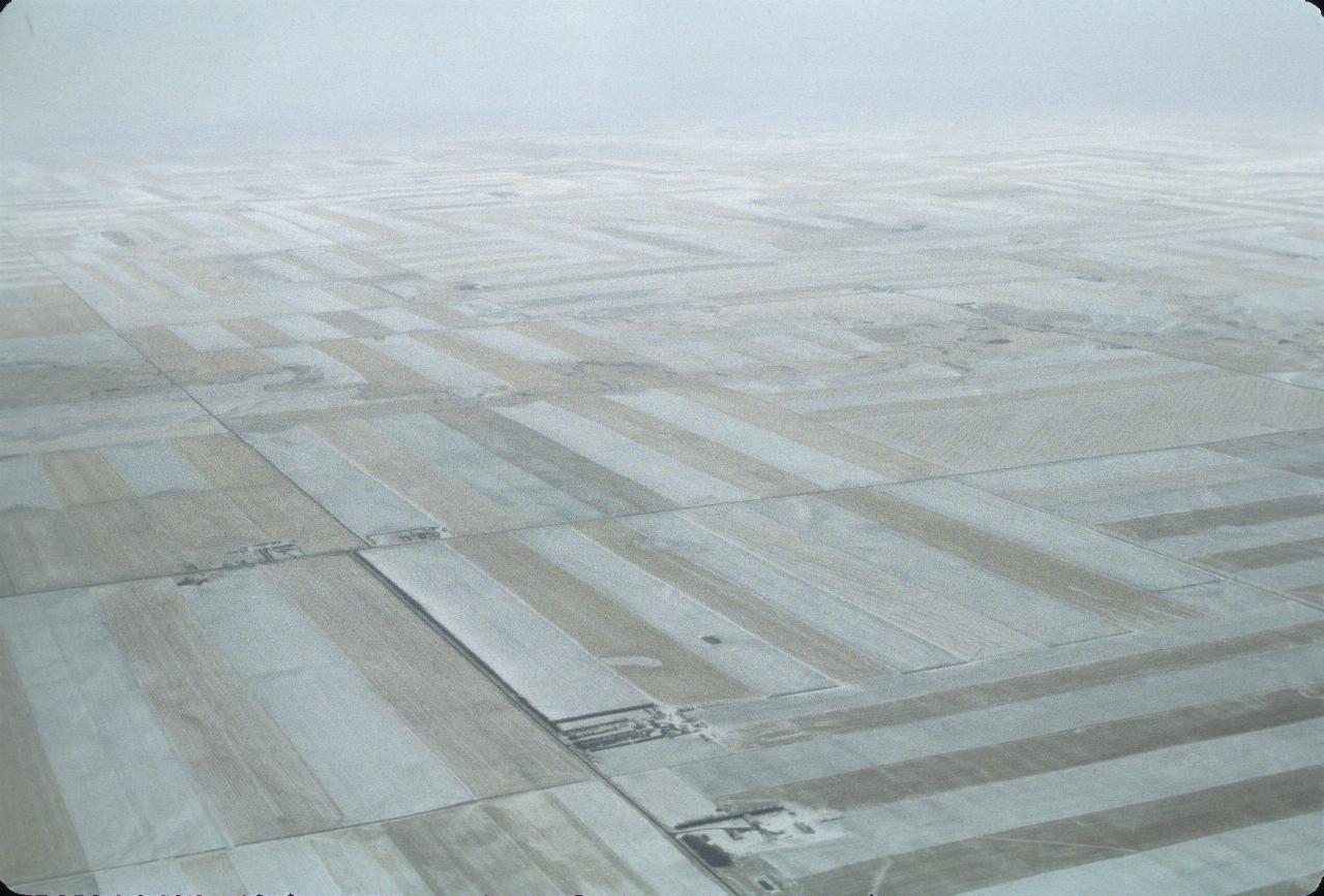 Snow covered fields between Lethbridge and Calgary