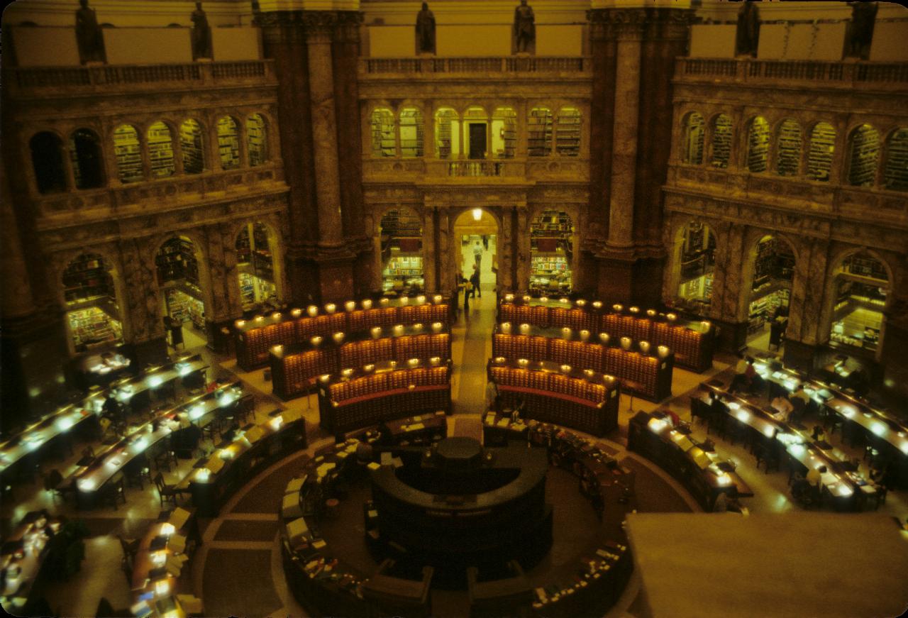 Library central area with circular seating and other library objects from that time.