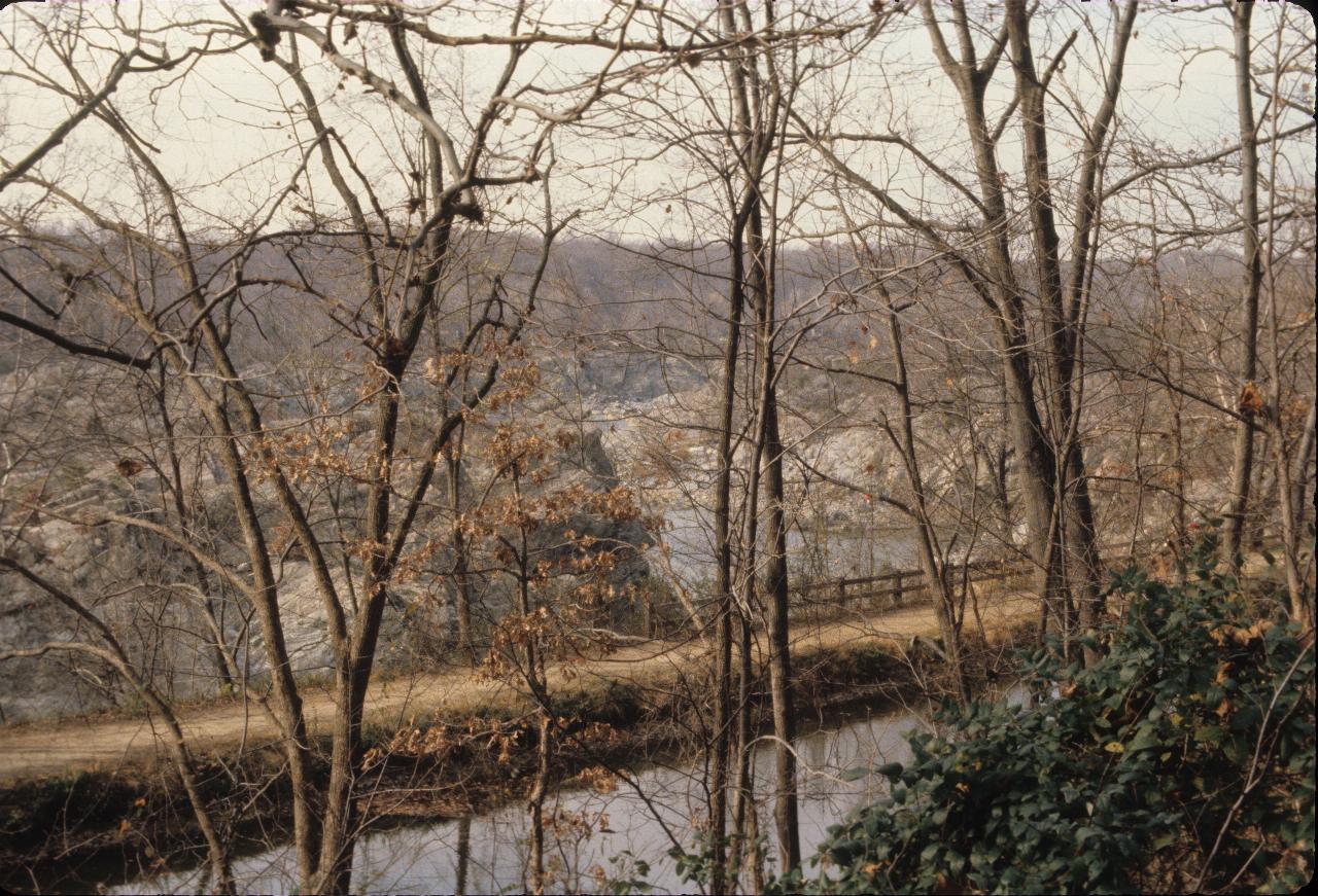 Canal in foreground with a river below in the background.