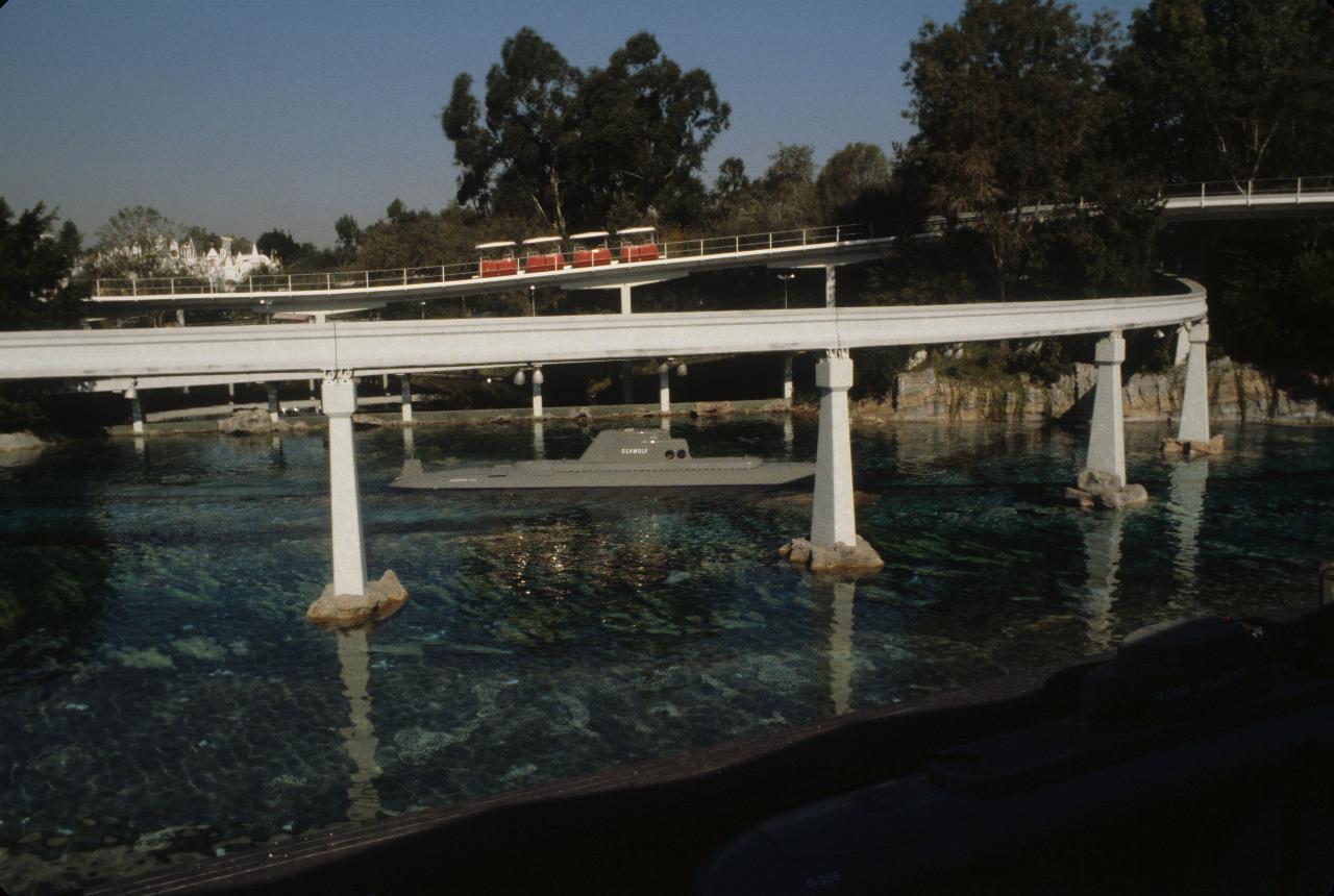 Three modes of transport: submarine, people mover, monorail (track)