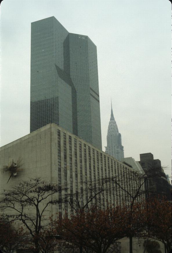 Tall building, with another one in the background.