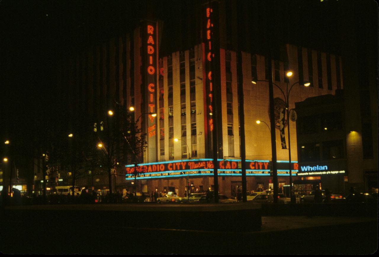 Illuminated corner building at night