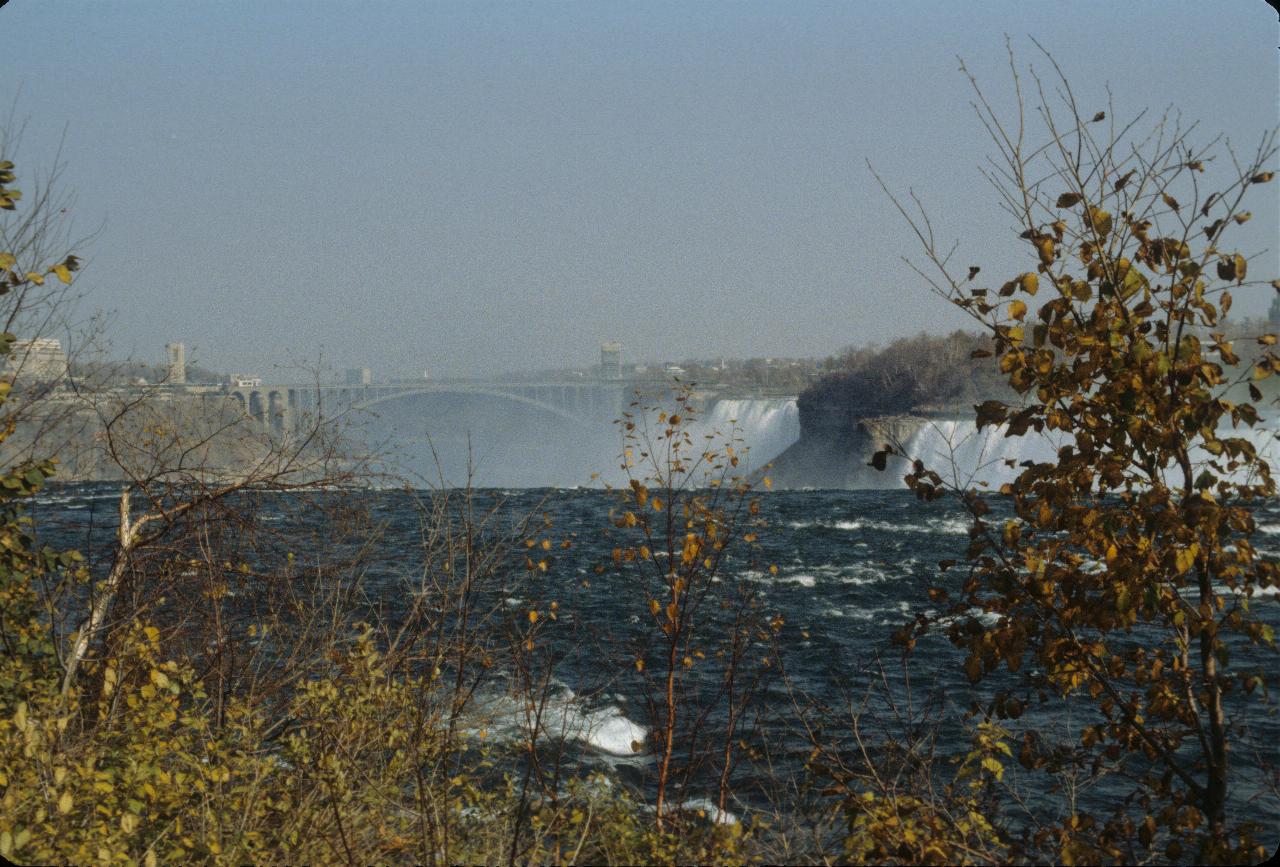 Looking down river, over the falls with mist rising beyond