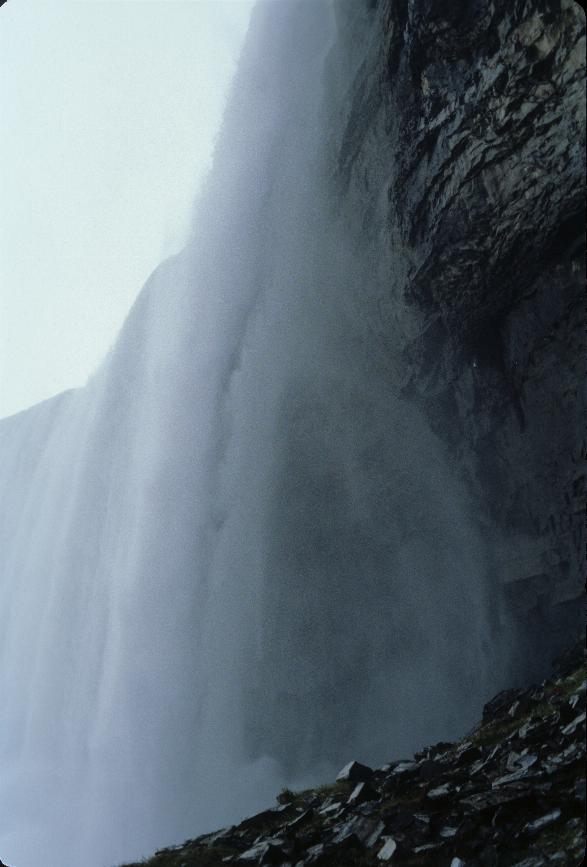 The edge of the falls and the rock behind